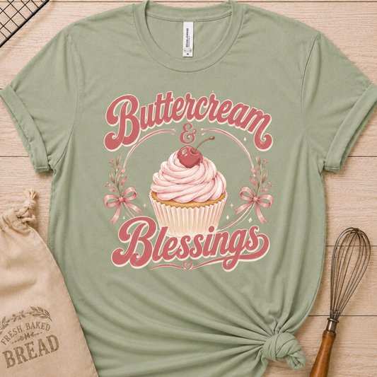 Sage green women's relaxed fit t-shirt reading Buttercream and Blessings with a frosted cupcake illustration.