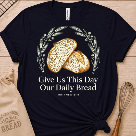 Navy women's relaxed fit t-shirt with the Daily Bread design featuring two rustic half loaves side by side, inspired by Matthew 6:11.