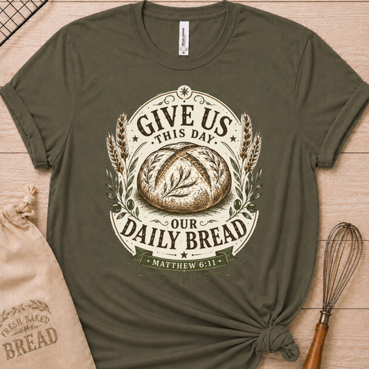 Military green women's relaxed fit t-shirt with the Daily Bread emblem printed in cream, a clean badge-style bread illustration inspired by Matthew 6:11.