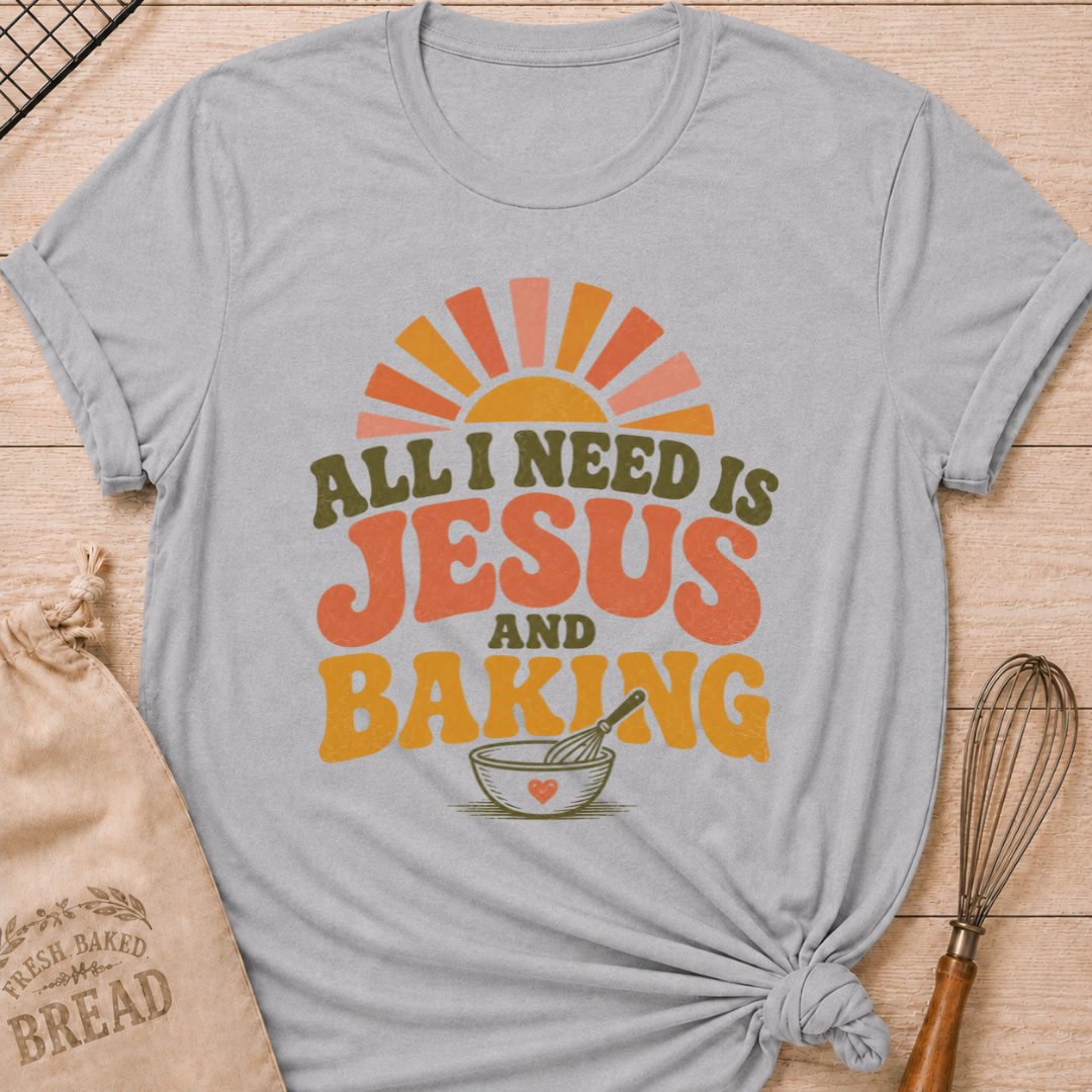 Athletic Heather All I Need Is Jesus and Baking women's relaxed fit tee with bold retro lettering, a rising sun, mixing bowl, and whisk