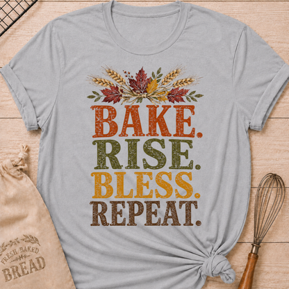 Athletic Heather women's relaxed fit tee with distressed vintage Bake Rise Bless Repeat lettering and a tied bundle of wheat and autumn leaves