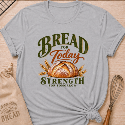 Athletic Heather women's relaxed fit tee with a golden artisan loaf and wheat in rich earthy tones, with bold vintage Bread for Today, Strength for Tomorrow lettering