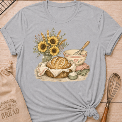 Athletic Heather Bread and Sunflower Bouquet women's relaxed fit tee with a rustic artisan loaf, a vintage mixing bowl, and a bouquet of sunflowers and wheat