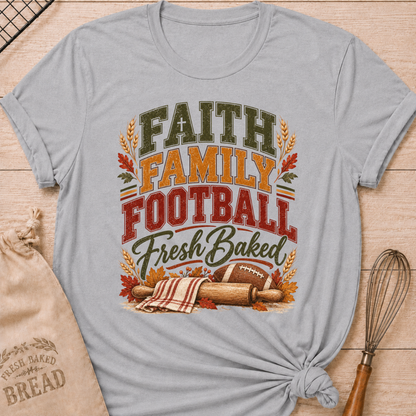 Athletic Heather women's relaxed fit tee with vintage collegiate Faith Family Football Fresh Baked lettering above wheat, autumn leaves, a rolling pin and a classic football