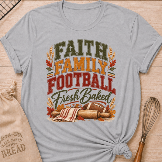 Athletic Heather women's relaxed fit tee with vintage collegiate Faith Family Football Fresh Baked lettering above wheat, autumn leaves, a rolling pin and a classic football