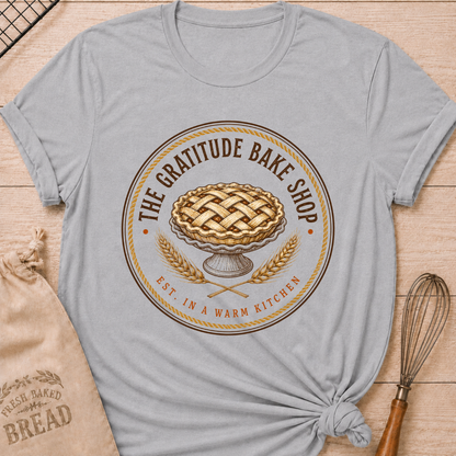 Athletic Heather women's relaxed fit tee with a vintage round bake shop emblem, lattice pie and golden wheat