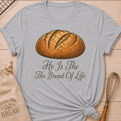 Athletic heather women's relaxed fit t-shirt with the words He Is the Bread of Life in graceful vintage lettering and an illustrated artisan loaf.