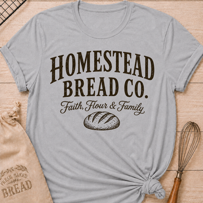 Athletic heather women's relaxed fit t-shirt with a vintage bread graphic and the words Homestead Bread Co. Faith, Flour and Family.