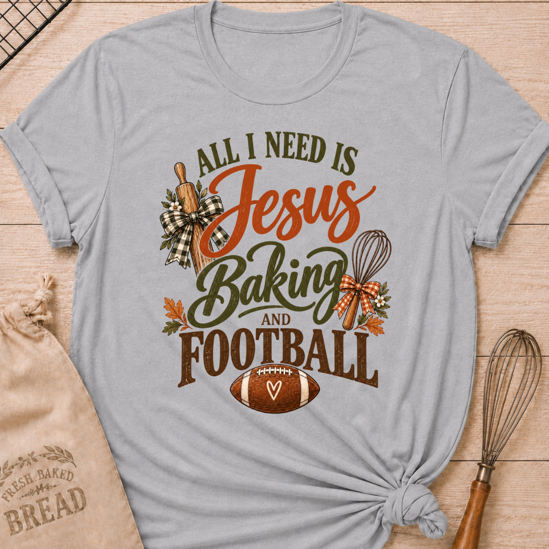 Athletic Heather women's relaxed fit tee with bold vintage All I Need Is Jesus Baking and Football lettering, a rolling pin, whisk, gingham bows, autumn leaves and a classic football