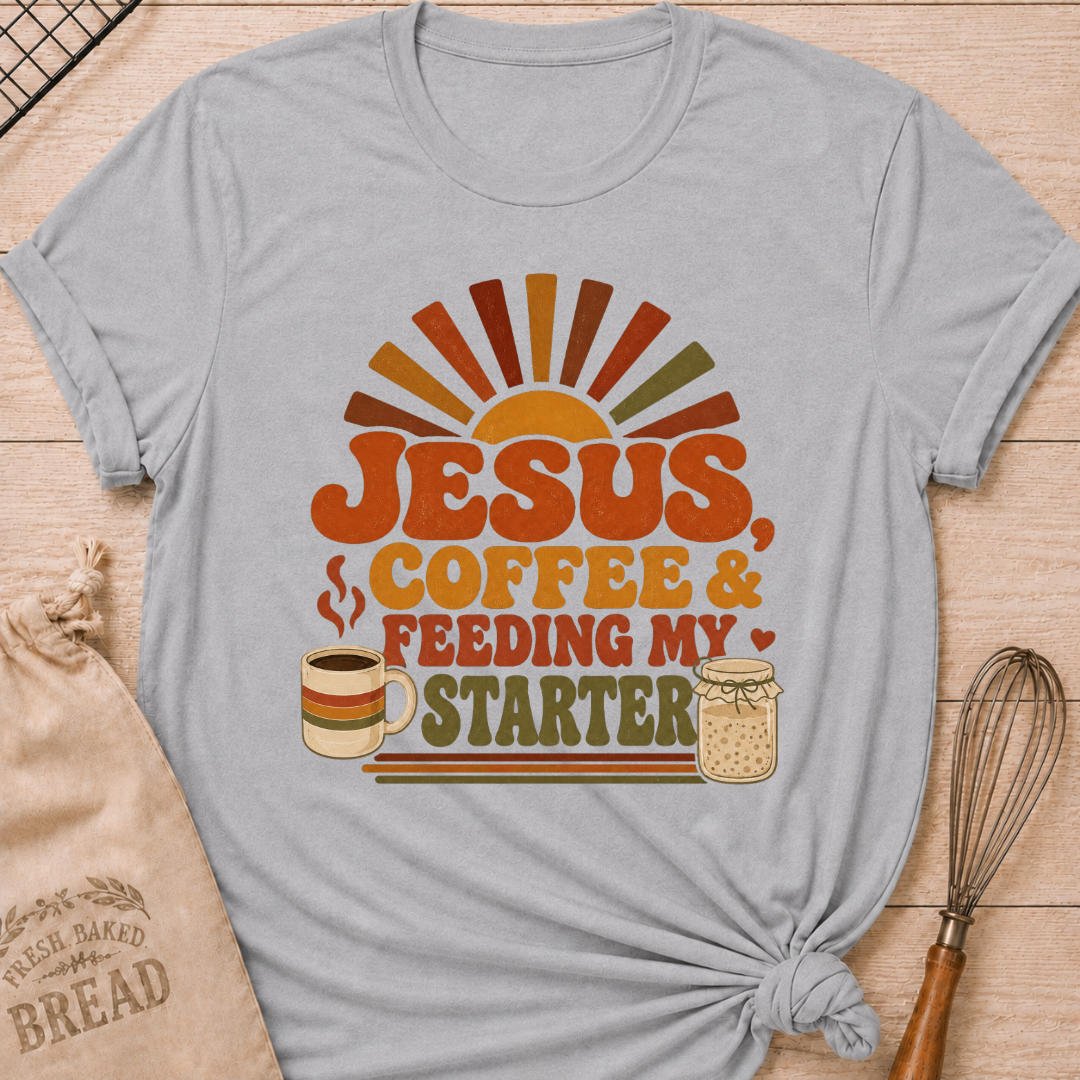 Athletic heather women's relaxed fit t-shirt with the words Jesus, Coffee & Feeding My Starter in bold retro lettering with a steaming mug and a sourdough starter jar.