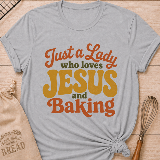 Athletic Heather Just A Lady Who Loves Jesus And Baking women's relaxed fit tee with playful retro typography in warm vintage colors
