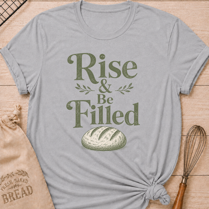Athletic heather women's relaxed fit t-shirt with the words Rise and Be Filled in vintage lettering above a rustic loaf of bread and leafy accents.