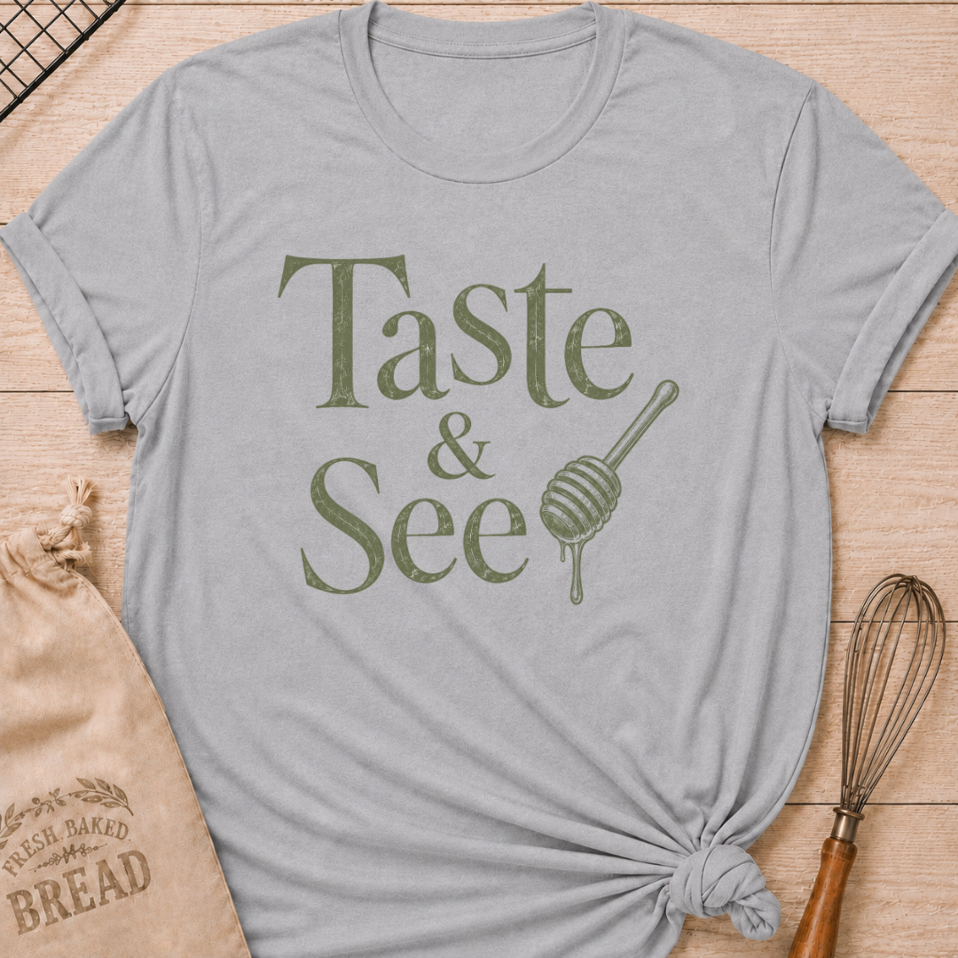 Athletic heather women's relaxed fit t-shirt with the words Taste and See in vintage lettering and a dripping honey dipper.