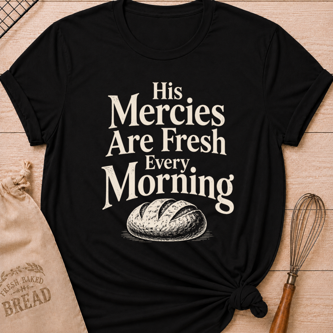 Black women's relaxed fit t-shirt with the words His Mercies Are Fresh Every Morning above a rustic loaf of bread.