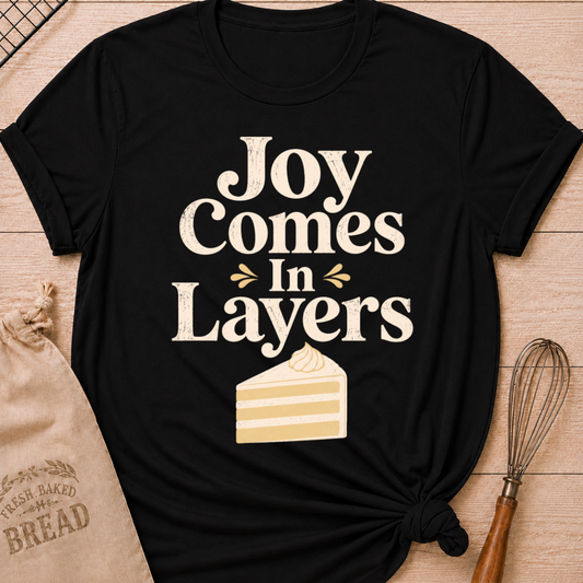 Black Joy Comes in Layers women's relaxed fit tee with playful vintage lettering and a layered slice of cake