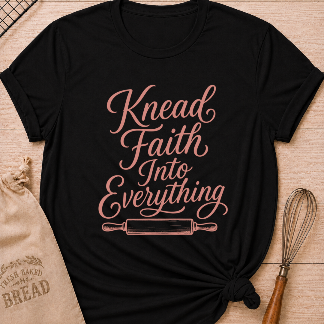 Black women's relaxed fit t-shirt with Knead Faith Into Everything in graceful script and a classic rolling pin.