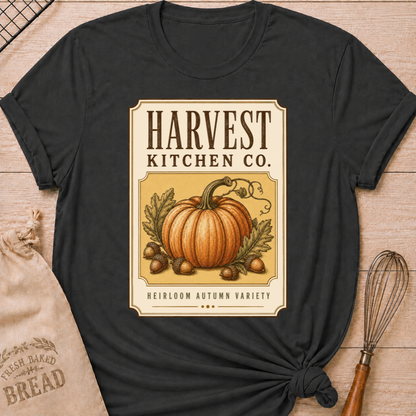 Dark Heather Grey women's relaxed fit tee with a vintage produce label design, an heirloom pumpkin, oak leaves and acorns