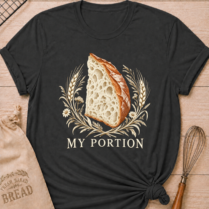Dark Heather Grey women's relaxed fit tee with a detailed slice of artisan bread framed by wheat and delicate wildflowers in warm earthy tones, with My Portion lettering below