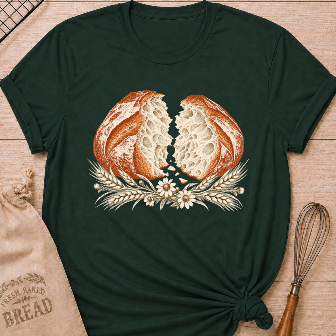 Forest Green women's relaxed fit tee with a torn artisan loaf showing its airy crumb, framed by wheat and delicate wildflowers