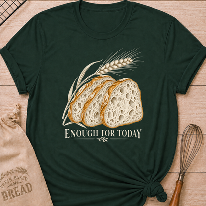Forest Green women's relaxed fit tee with three rustic slices of artisan bread and a graceful stalk of wheat in a warm vintage style, with Enough for Today lettering
