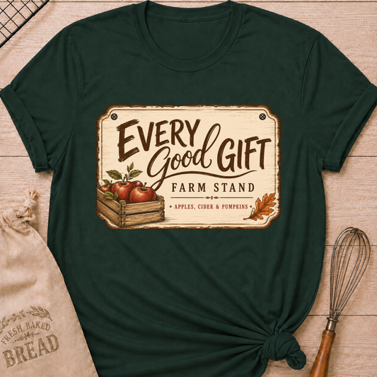 Forest Green women's relaxed fit tee with a vintage farm stand design, a wooden crate of apples, cider and pumpkins