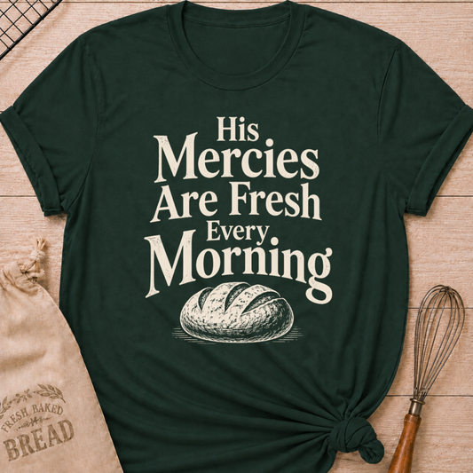Forest green women's relaxed fit t-shirt with the words His Mercies Are Fresh Every Morning above a rustic loaf of bread.