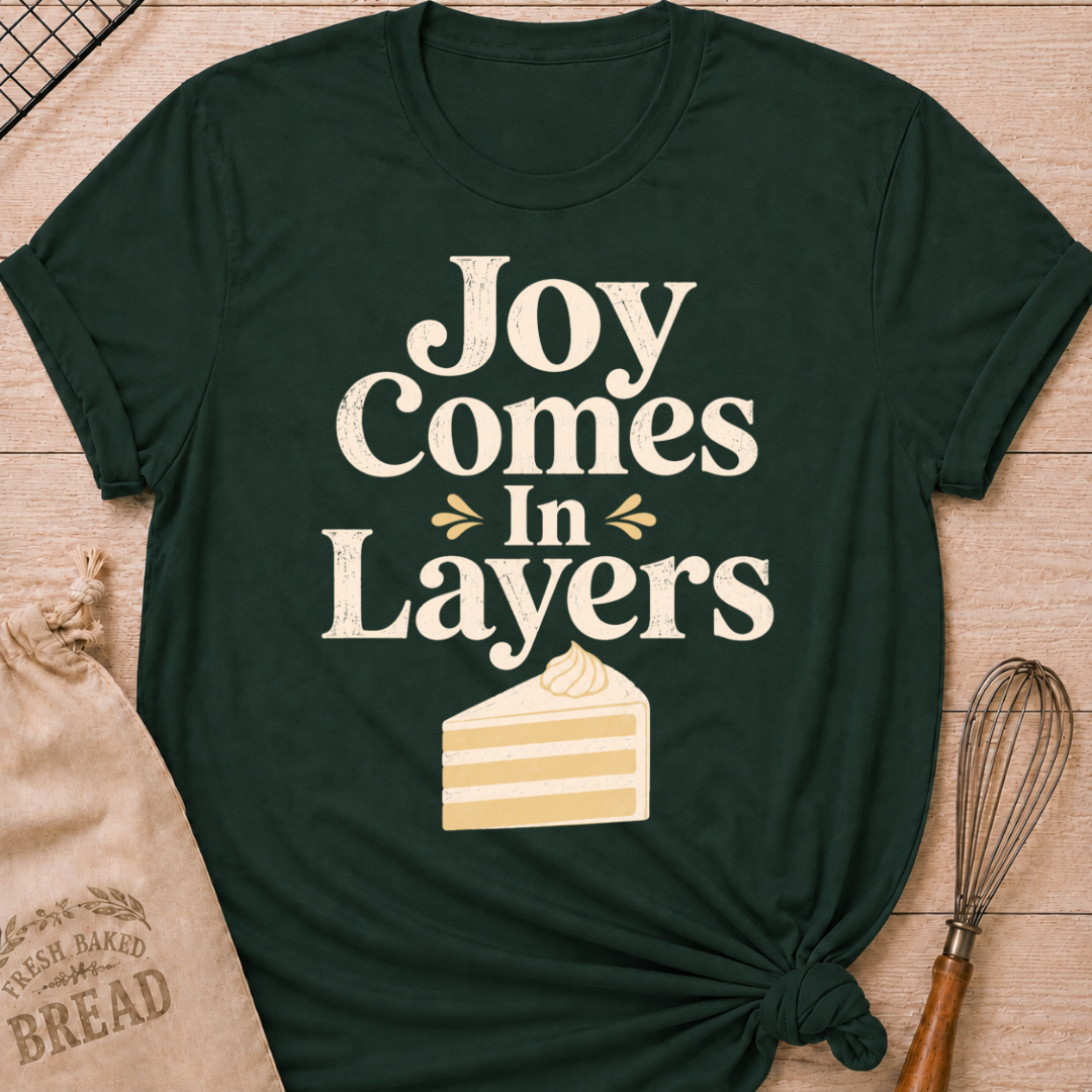 Forest Green Joy Comes in Layers women's relaxed fit tee with playful vintage lettering and a layered slice of cake