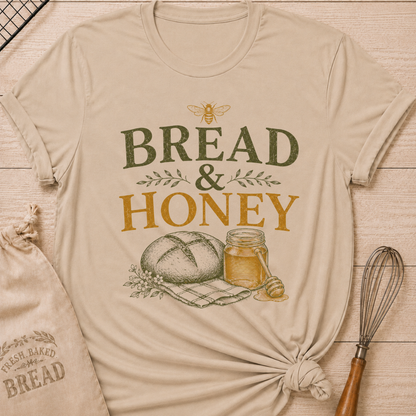 Heather Stone Bread and Honey Bee women's relaxed fit tee with a rustic loaf, golden honey, a honeybee and delicate greenery