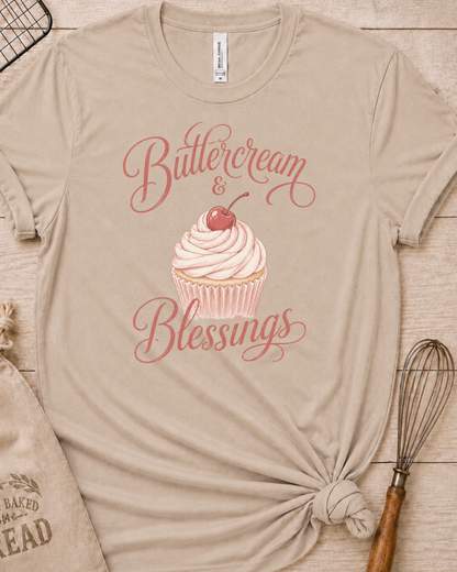 Heather stone women's relaxed fit t-shirt reading Buttercream and Blessings with a frosted cupcake illustration.