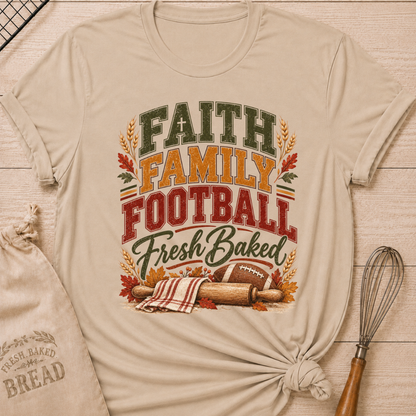 Heather Stone women's relaxed fit tee with vintage collegiate Faith Family Football Fresh Baked lettering above wheat, autumn leaves, a rolling pin and a classic football