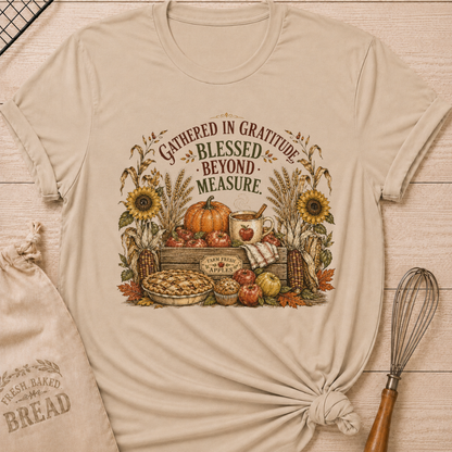 Heather Stone women's relaxed fit tee with a vintage harvest scene of apples, pumpkins, wheat, corn, sunflowers and fresh-baked pie