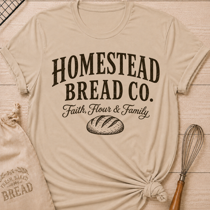 Heather stone women's relaxed fit t-shirt with a vintage bread graphic and the words Homestead Bread Co. Faith, Flour and Family.