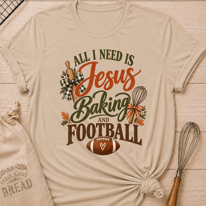 Heather Stone women's relaxed fit tee with bold vintage All I Need Is Jesus Baking and Football lettering, a rolling pin, whisk, gingham bows, autumn leaves and a classic football
