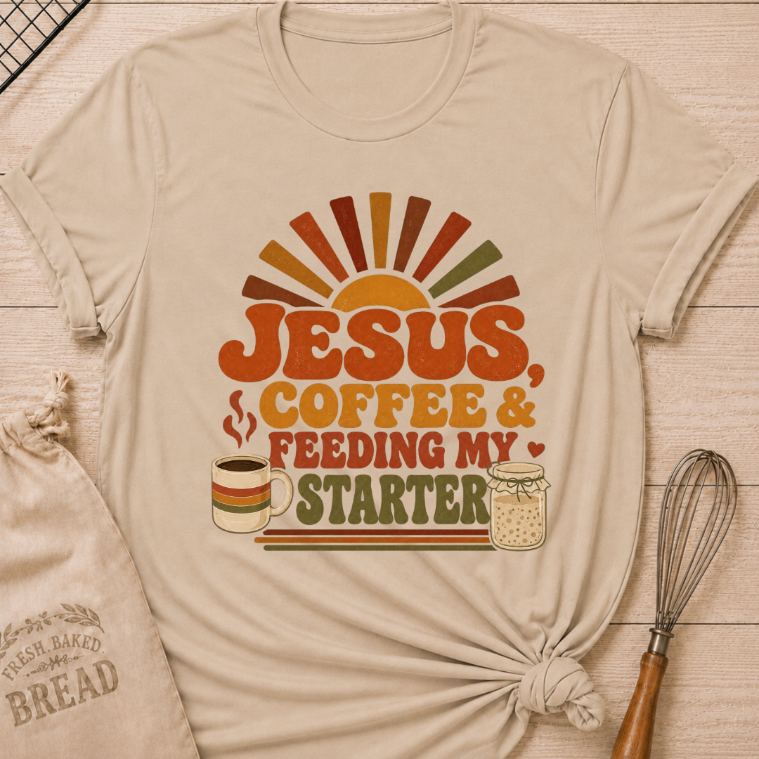 Heather stone women's relaxed fit t-shirt with the words Jesus, Coffee & Feeding My Starter in bold retro lettering with a steaming mug and a sourdough starter jar.
