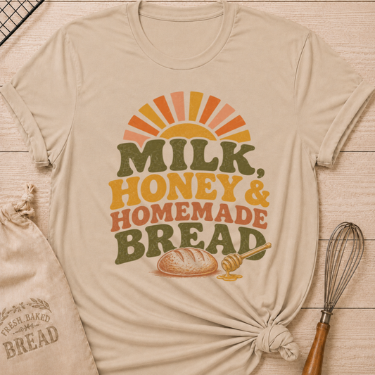 Heather Stone Milk, Honey and Homemade Bread women's relaxed fit tee with vintage farm stand lettering, rising sun, artisan loaf, and honey dipper