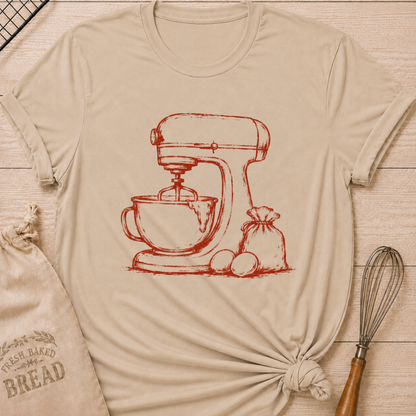 Heather stone women's relaxed fit t-shirt with a vintage stand mixer, a flour sack and fresh eggs in a single color sketch.