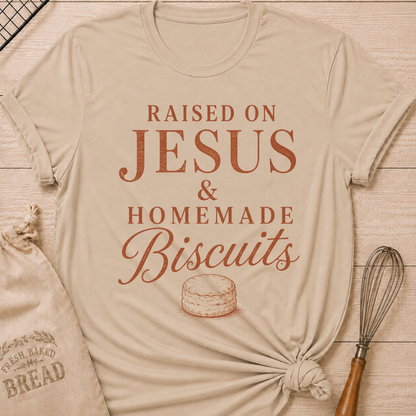 Heather Stone Raised On Jesus and Homemade Biscuits women's relaxed fit tee with warm vintage typography and a classic biscuit