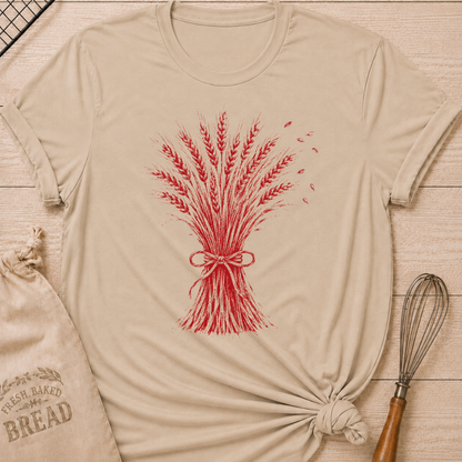 Heather Stone women's relaxed fit tee with a hand-tied sheaf of wheat in a warm vintage red, with delicate grain details and a softly distressed finish