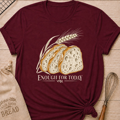 Maroon women's relaxed fit tee with three rustic slices of artisan bread and a graceful stalk of wheat in a warm vintage style, with Enough for Today lettering
