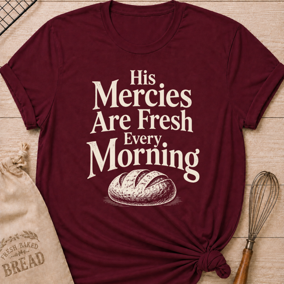 Maroon women's relaxed fit t-shirt with the words His Mercies Are Fresh Every Morning above a rustic loaf of bread.