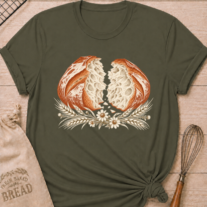 Military Green women's relaxed fit tee with a torn artisan loaf showing its airy crumb, framed by wheat and delicate wildflowers