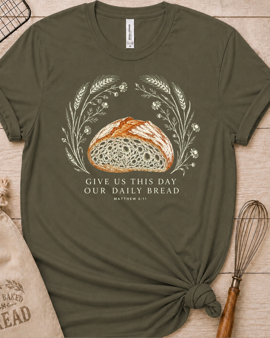 Military green women's relaxed fit t-shirt with the Daily Bread design featuring a rustic half loaf of bread, inspired by Matthew 6:11.