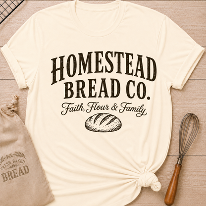 Natural women's relaxed fit t-shirt with a vintage bread graphic and the words Homestead Bread Co. Faith, Flour and Family.