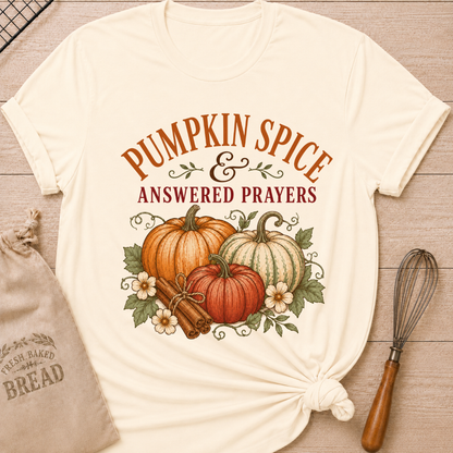 Natural women's relaxed fit tee with vintage Pumpkins and Prayers lettering, a pumpkin arrangement, cinnamon sticks, florals and trailing vines
