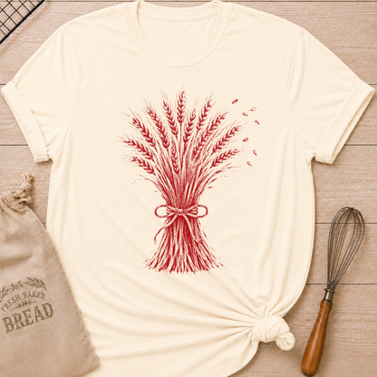 Natural women's relaxed fit tee with a hand-tied sheaf of wheat in a warm vintage red, with delicate grain details and a softly distressed finish