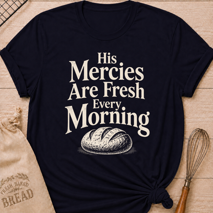 Navy women's relaxed fit t-shirt with the words His Mercies Are Fresh Every Morning above a rustic loaf of bread.