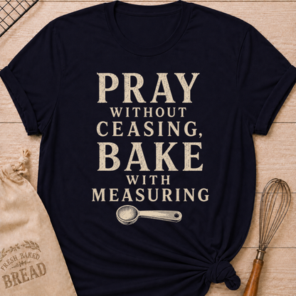 Navy Pray Without Ceasing, Bake With Measuring women's relaxed fit tee with bold vintage lettering and a measuring spoon