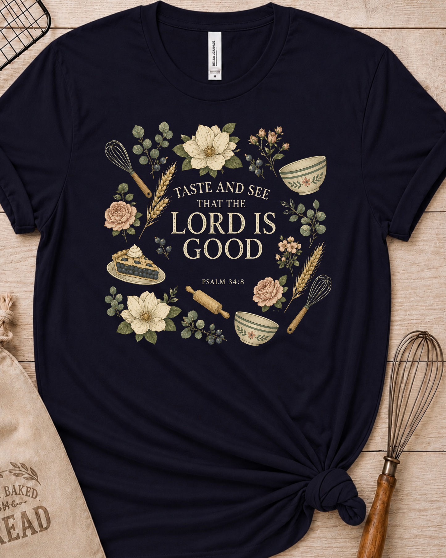 Navy women's relaxed fit t-shirt with Taste and See from Psalm 34:8 inside a soft botanical wreath.
