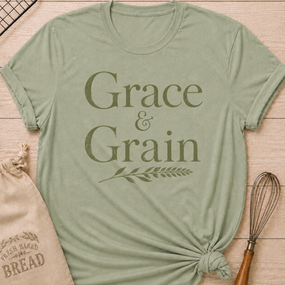 Sage green women's relaxed fit t-shirt with the words Grace and Grain in vintage lettering and a delicate wheat sprig.