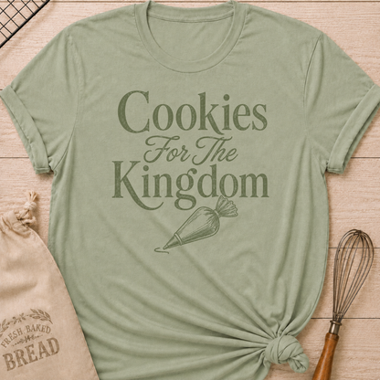 Sage green women's relaxed fit t-shirt with the words Cookies for the Kingdom in vintage lettering and a classic piping bag.